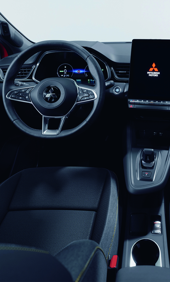 Mitsubishi ASX Select Innenraum-Ansicht mit schwarzen Sitzen, digitalem Cockpit, großem Touchscreen-Display und modernem Lenkrad